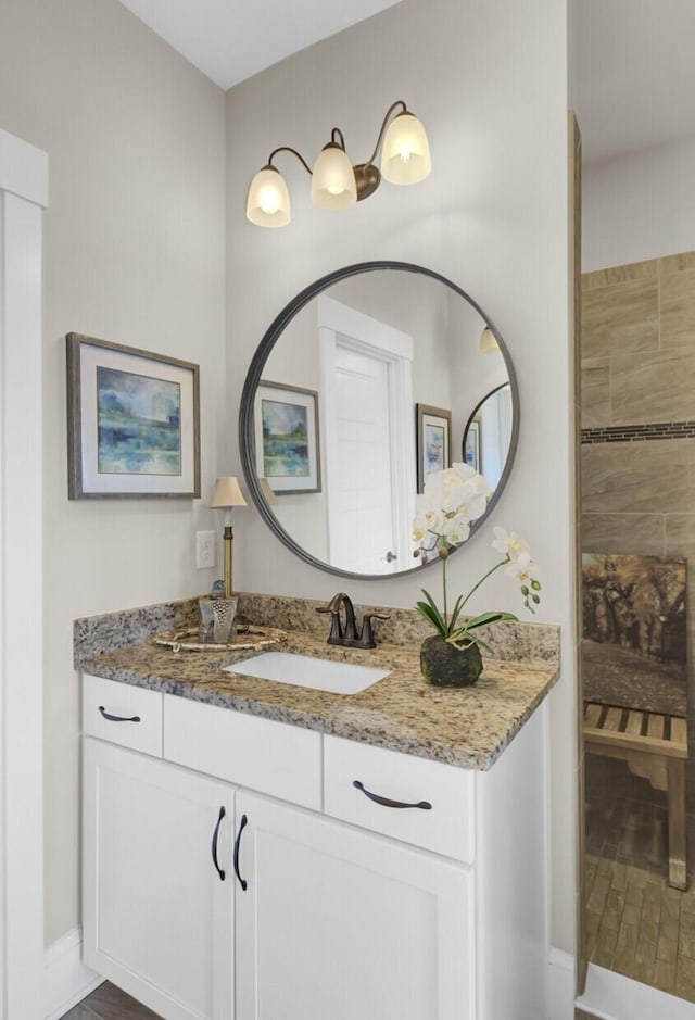 345 Turnstone St, Mount Pleasant, SC 29464 - bathroom with baseboards, wood finished floors, and vanity
