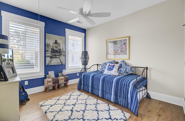 345 Turnstone St, Mount Pleasant, SC 29464 - bedroom with baseboards, visible vents, wood finished floors, and a ceiling fan