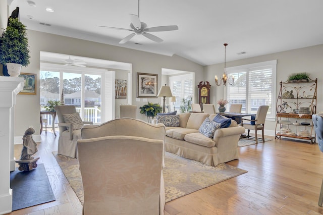 345 Turnstone St, Mount Pleasant, SC 29464 - living room with visible vents, plenty of natural light, ceiling fan with notable chandelier, and light wood finished floors