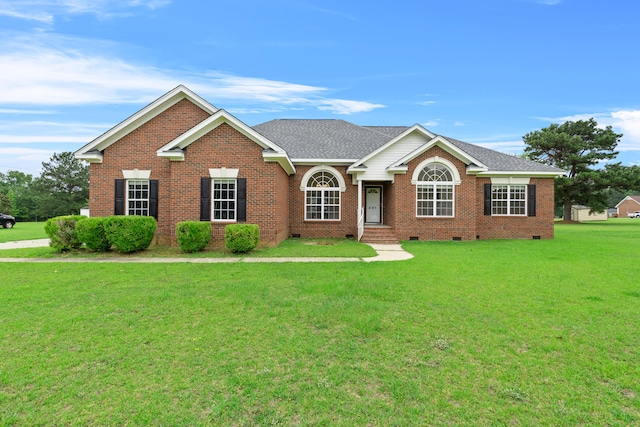 331 Kinard St, Orangeburg, SC 29118 - view of front of home with crawl space, a front lawn, brick siding, and roof with shingles