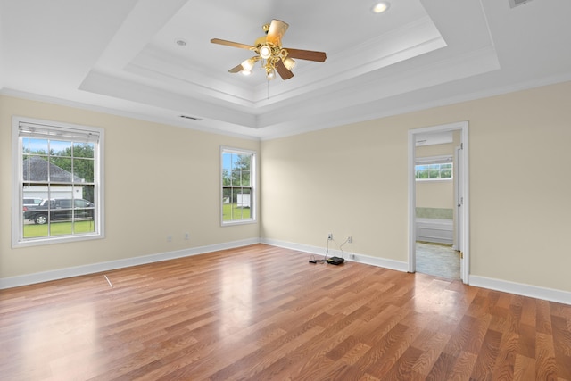 331 Kinard St, Orangeburg, SC 29118 - spare room featuring a raised ceiling, light wood-type flooring, ornamental molding, a ceiling fan, and recessed lighting