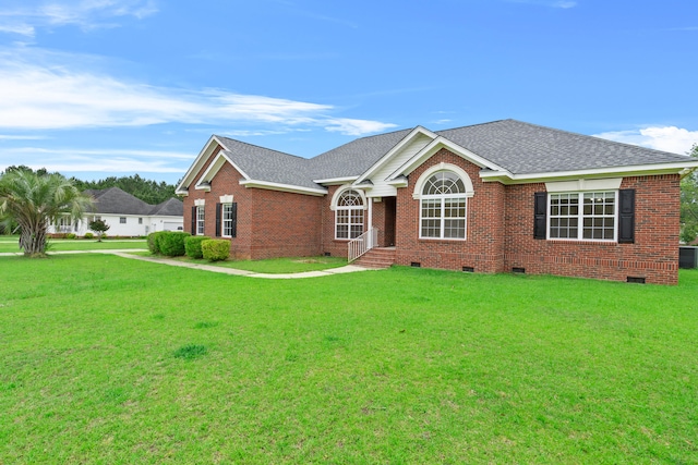 331 Kinard St, Orangeburg, SC 29118 - ranch-style house with crawl space, a shingled roof, brick siding, and a front yard