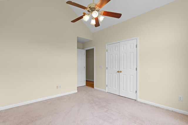 331 Kinard St, Orangeburg, SC 29118 - unfurnished bedroom featuring carpet floors, a closet, high vaulted ceiling, and a ceiling fan