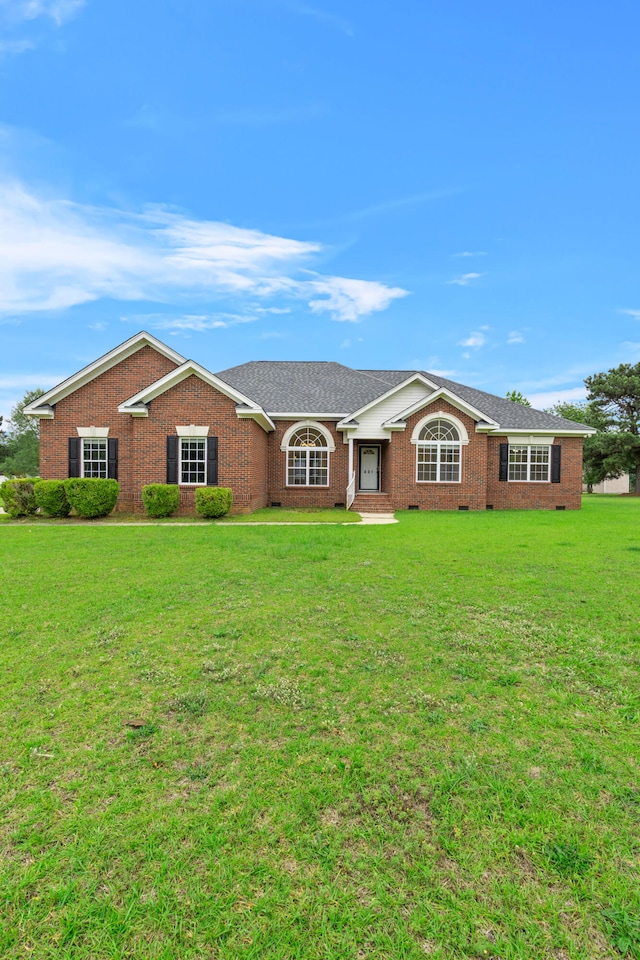 331 Kinard St, Orangeburg, SC 29118 - ranch-style home featuring crawl space, a front lawn, and brick siding