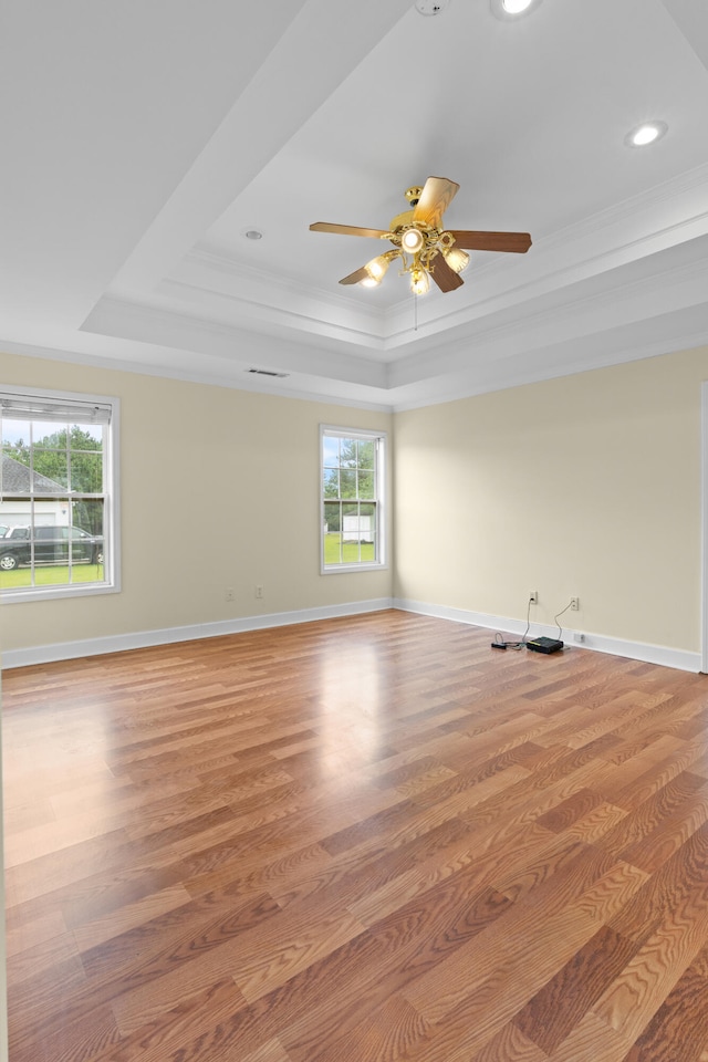 331 Kinard St, Orangeburg, SC 29118 - spare room with a raised ceiling, ceiling fan, light wood-type flooring, crown molding, and recessed lighting