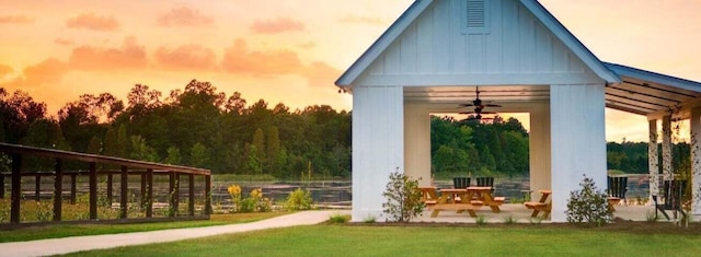 surrounding community with a gazebo and a lawn