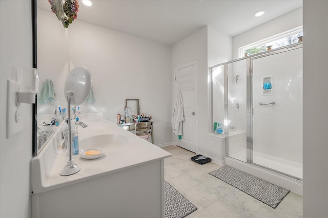 bathroom with vanity and walk in shower