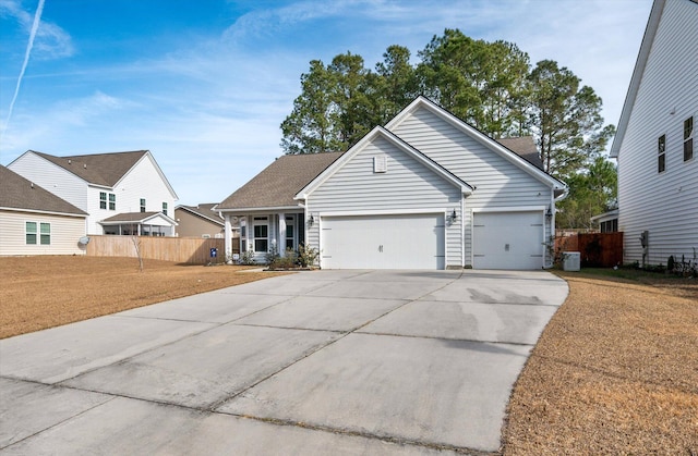 view of front facade with a front lawn and a garage