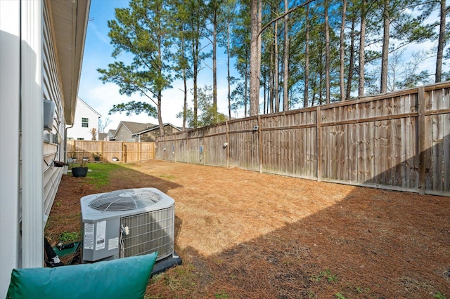 view of yard featuring central AC unit