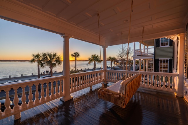 deck at dusk with a water view