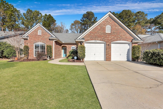 front facade featuring a front yard and a garage