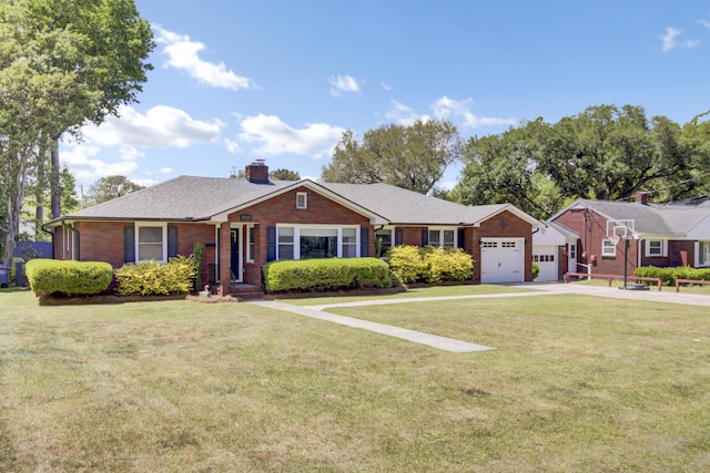 ranch-style house featuring a garage, a chimney, concrete driveway, and a front yard