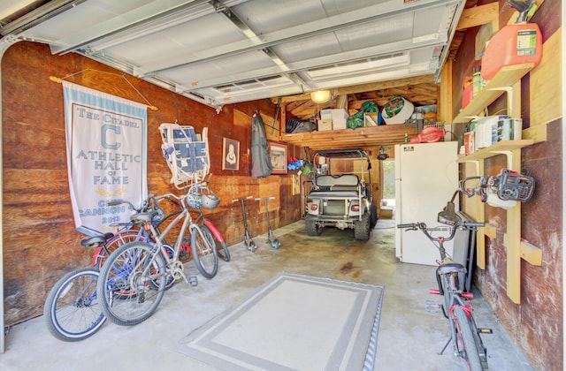 garage with freestanding refrigerator