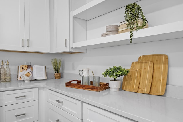 kitchen featuring white cabinets