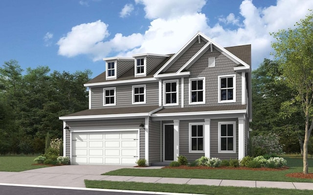 view of front of house with a garage and a front lawn