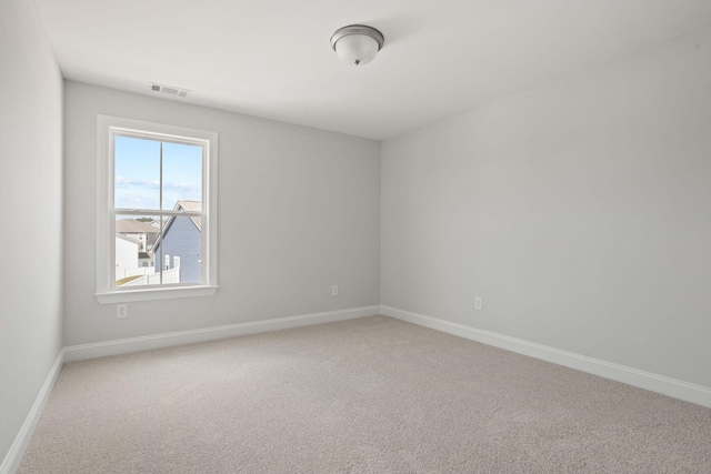 empty room featuring carpet floors