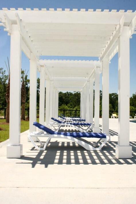 view of home's community with a patio area and a pergola