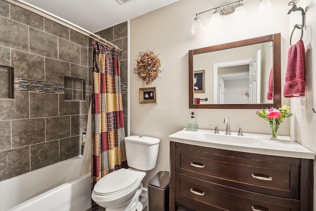 bathroom with shower / tub combo, vanity, and toilet