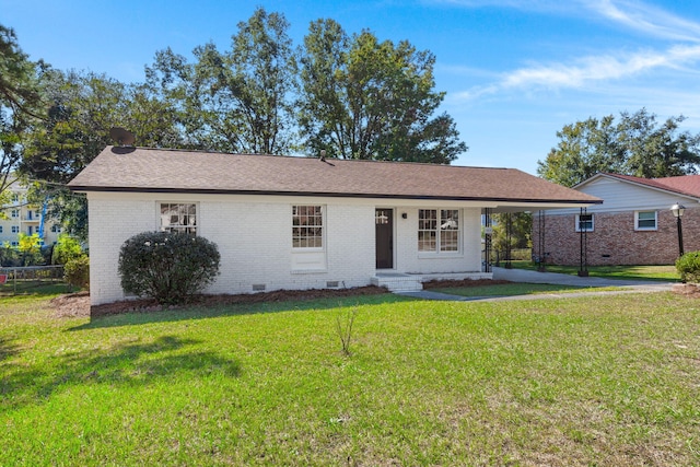 ranch-style home with a front yard