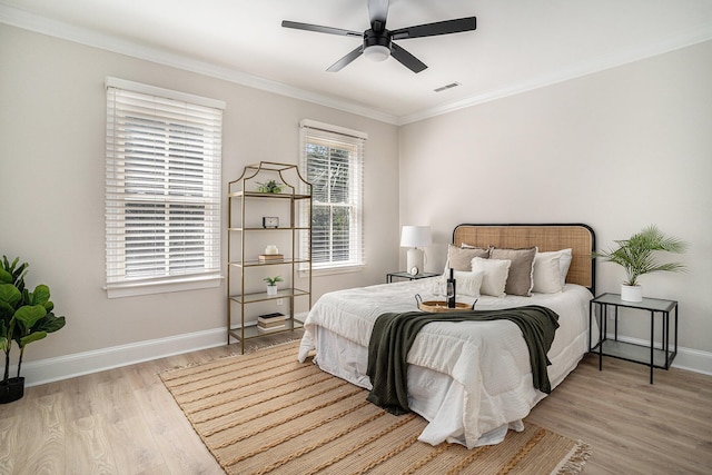 82 Ponsbury Rd, Mount Pleasant, SC 29464 - bedroom featuring wood finished floors, baseboards, crown molding, and a ceiling fan