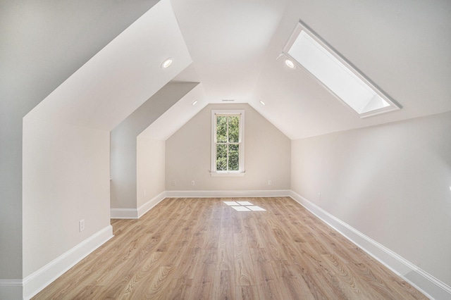 82 Ponsbury Rd, Mount Pleasant, SC 29464 - bonus room with a skylight, light wood-type flooring, lofted ceiling, and baseboards