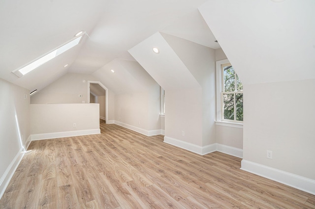 82 Ponsbury Rd, Mount Pleasant, SC 29464 - bonus room featuring lofted ceiling, light wood-type flooring, a skylight, recessed lighting, and baseboards