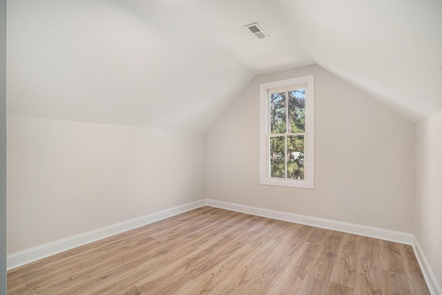 82 Ponsbury Rd, Mount Pleasant, SC 29464 - bonus room featuring light wood-type flooring, vaulted ceiling, and baseboards