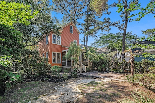 82 Ponsbury Rd, Mount Pleasant, SC 29464 - rear view of property featuring a sunroom