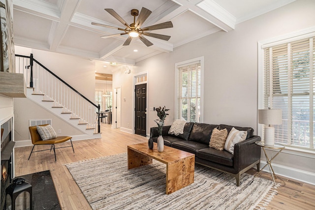 82 Ponsbury Rd, Mount Pleasant, SC 29464 - living area featuring coffered ceiling, ceiling fan, wood finished floors, plenty of natural light, and a fireplace
