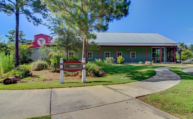 121 Cherry Grv, Summerville, SC 29483 - view of front of house with a front yard and metal roof