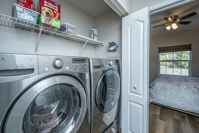 washroom with laundry area, wood finished floors, separate washer and dryer, and ceiling fan