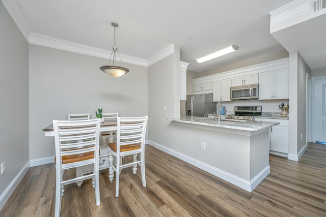 kitchen featuring white cabinetry, dark wood-style flooring, and appliances with stainless steel finishes