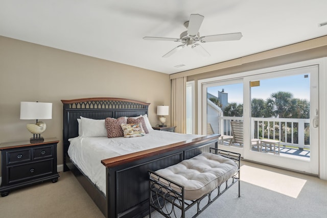 bedroom featuring ceiling fan, access to outside, and light colored carpet