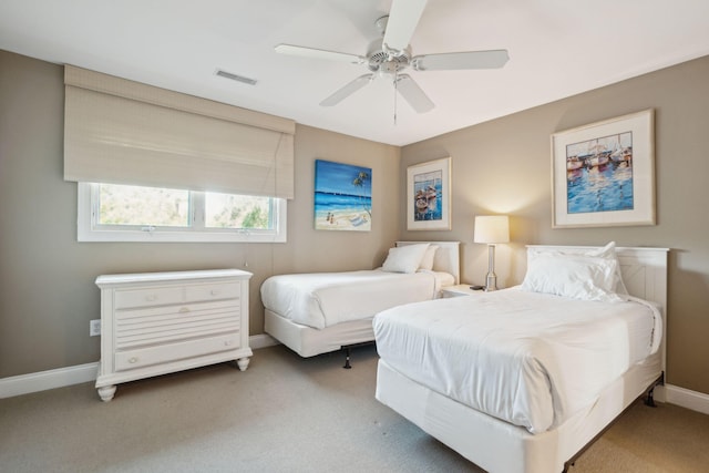 bedroom with ceiling fan and carpet floors