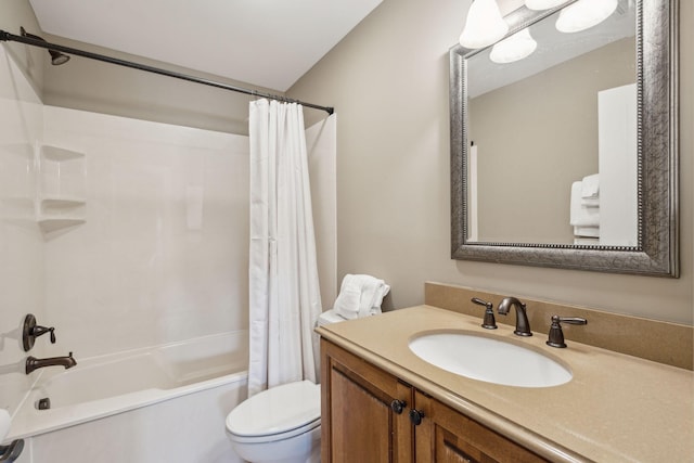 full bathroom with vanity, toilet, and shower / tub combo with curtain