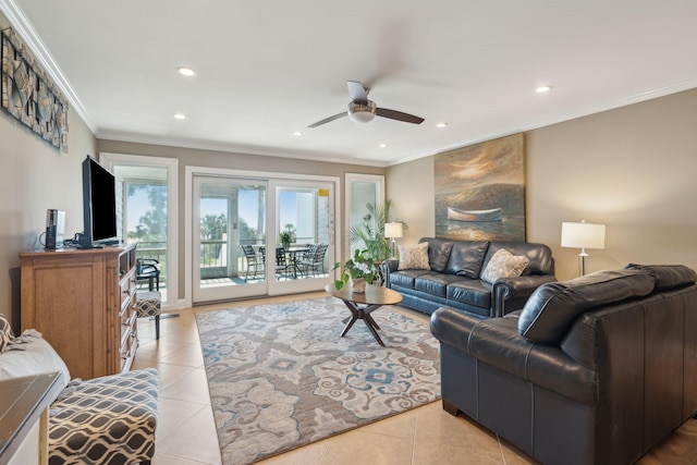 tiled living room with crown molding and ceiling fan