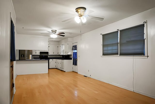 kitchen featuring white cabinets, stainless steel fridge with ice dispenser, light hardwood / wood-style flooring, and ceiling fan