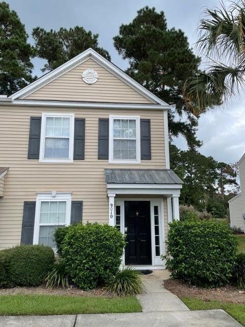 view of front of home with metal roof