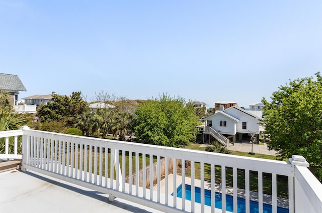 balcony featuring a pool side deck