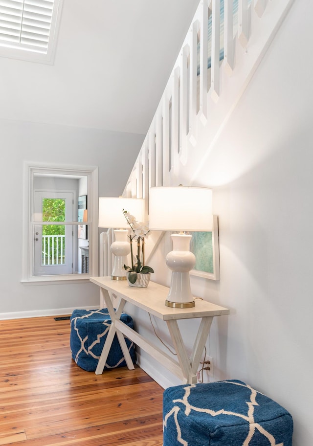 stairs with light wood-type flooring