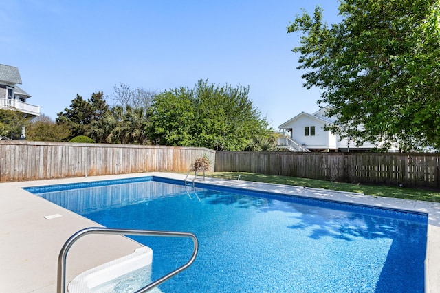view of pool with a fenced backyard and a fenced in pool