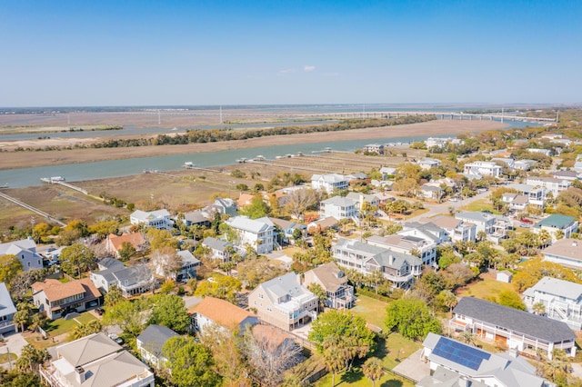 bird's eye view with a residential view and a water view