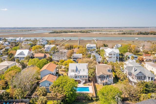 bird's eye view featuring a residential view and a water view