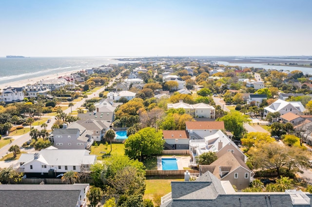 bird's eye view featuring a residential view and a water view