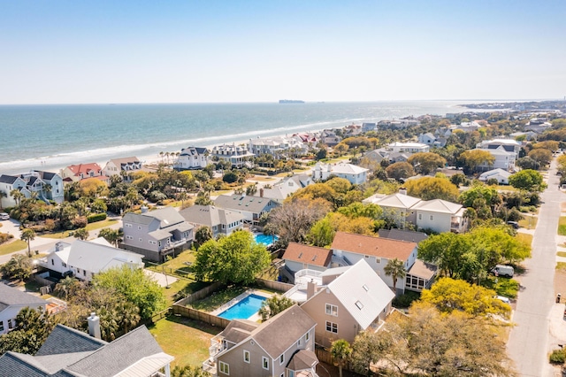 drone / aerial view featuring a water view and a residential view