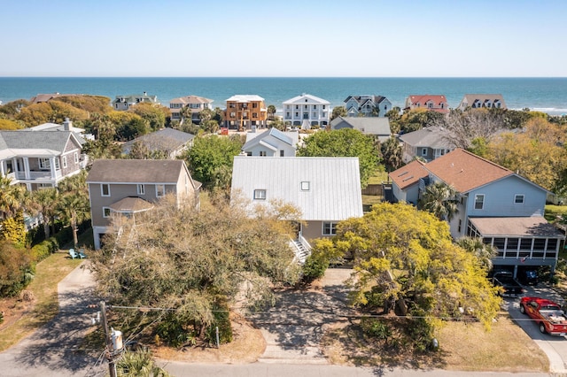aerial view featuring a residential view and a water view