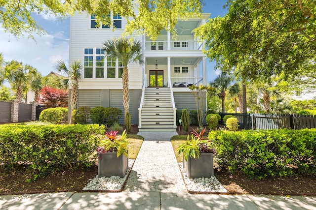 1331 Smythe St, Daniel Island, SC 29492 - view of front of house featuring stairway, fence, and covered porch