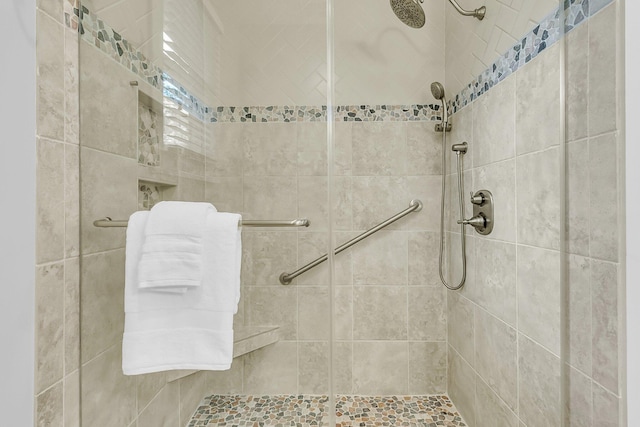 full bathroom featuring a stall shower