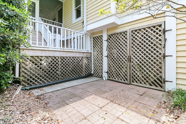 view of patio featuring stairway