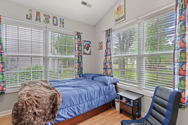 3486 Ashwycke St, Mount Pleasant, SC 29466 - bedroom featuring wood finished floors and vaulted ceiling